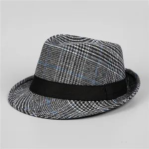 Macro detail of the houndstooth fabric and blue stripe on this vintage fedora hat
