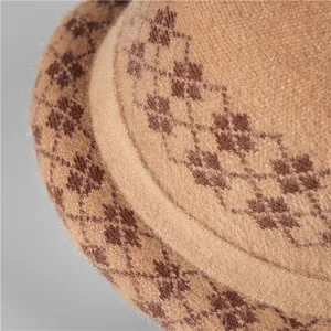 Women's vintage knit bucket hat in camel wool featuring retro floral diamond pattern texture