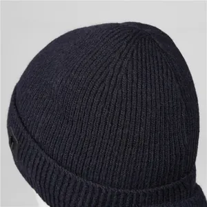 Winter knit beanie for elderly men in navy blue with thick lining and ear protection