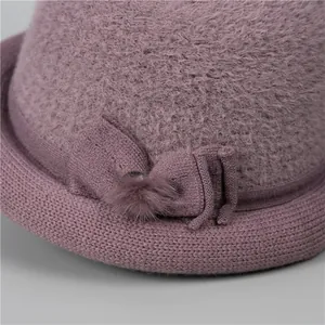 Elegant purple knitted wool bucket hat for elderly women with warm faux fur and floral bow