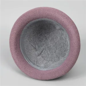 Detail view of the warm fleece lining and knitting texture of the winter beanie cap