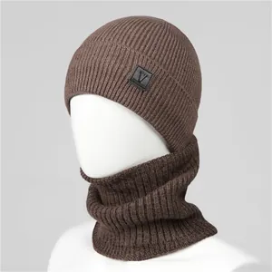 Close-up of brown winter knit beanie and scarf set with soft fleece lining for men