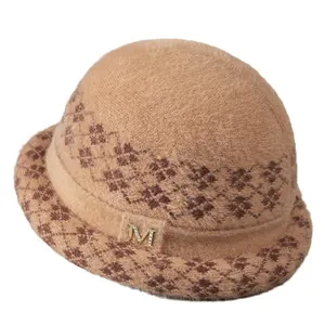 Women's warm knit bucket hat in camel with vintage diamond pattern and crystal M detail