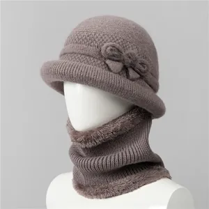 Close-up of women's knitted beanie and neck warmer set with warm plush lining