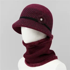 Close-up of winter knit hat and neck warmer set for elderly women with warm fleece lining