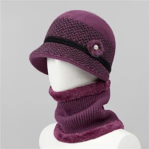 Close-up of purple winter knit hat and neck warmer set with faux pearl and fleece lining