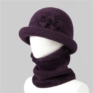 Detail of dark purple winter knitted hat and neck gaiter set with plush fleece lining