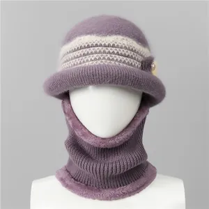 Detailed view of purple knit beanie and neck warmer set with faux fur trim and pearl bow