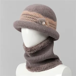 Detail of winter knit hat and neck warmer with plush lining and pearl decorations