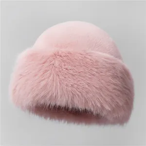 Close-up of pink faux fur Mongolian hat showing soft texture and thermal ear protection