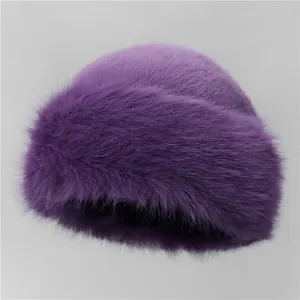 Close-up of fluffy purple faux fur winter hat showing soft texture and premium warmth