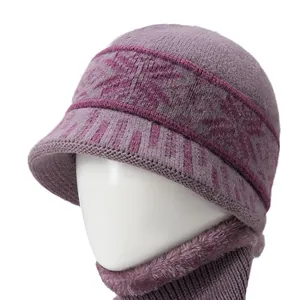 Conjunto de gorro y bufanda de punto violeta con copos de nieve y forro de vellón