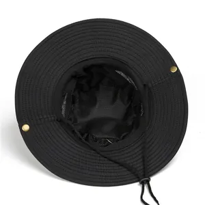 Detail of outdoor sun hat with breathable black mesh lining and adjustable chin strap