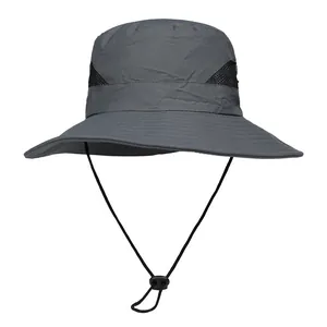 Detail view of dark grey sun hat showing breathable mesh side and adjustable wind cord