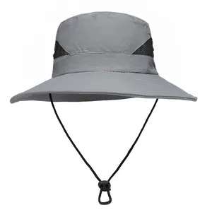 Detail of grey sun hat showing breathable black mesh panels and adjustable chin strap