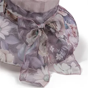 Elegant wide brim floral sun hat with large bow detail for women beach vacation