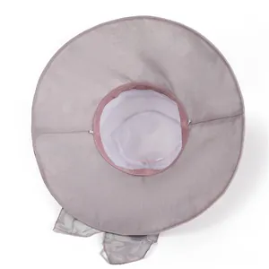 Detail of sun hat showing breathable mesh lining and adjustable drawstring inside