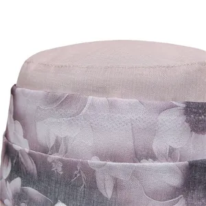 Detail of floral organza band and fine stitching on the breathable pink bucket hat