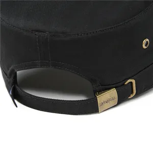 Detail of adjustable metal buckle and breathable eyelets on black cotton cadet cap
