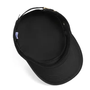 Internal detail of flat top cap showing cotton lining, sweatband and adjustable metal buckle