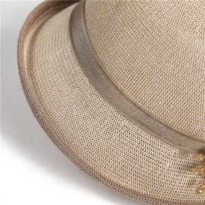 Women's khaki woven sun hat with satin ribbon and subtle sequin bead detailing