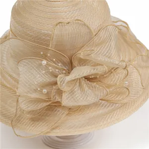 Elegant champagne organza sun hat for women featuring large floral decor with pearls