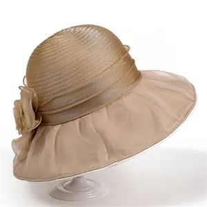 Elegant champagne gold organza sun hat with large brim and floral detail for women