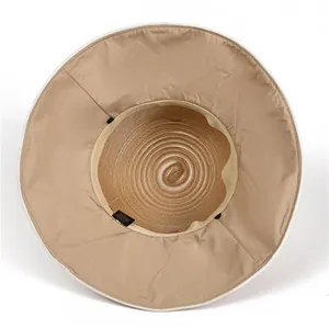 Detailed interior of women's straw sun hat with inner lining and sweatband view