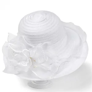 Detail of white organza sun hat with large floral petals and pearl center accents