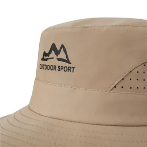 Close-up of khaki outdoor sun hat with breathable black mesh and logo embroidery