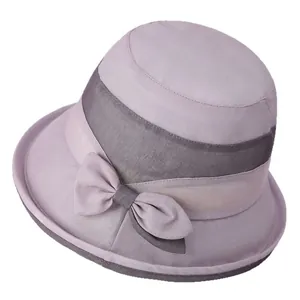 Elegant lavender sun hat for elderly women with wide brim and decorative bow for summer