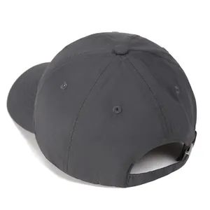 Detail of adjustable metal buckle and breathable fabric on dark grey quick-dry baseball cap