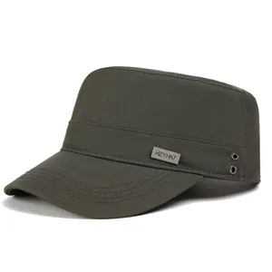 Close-up of military green cotton cadet hat with metal eyelets and side logo plate