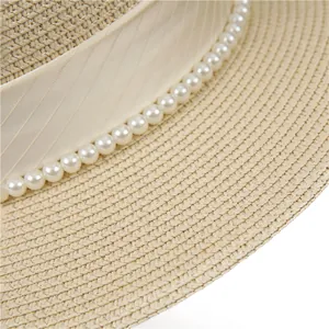 Chapeau de paille à haut plat style français avec perles élégantes pour la plage d'été