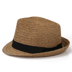 Close-up of breathable woven straw texture with a contrast black ribbon on this trilby hat