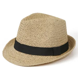 Close-up of lightweight woven straw jazz hat with a classic black grosgrain ribbon band