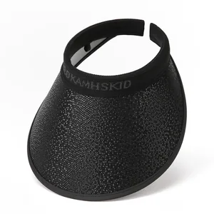 Detail of black open-top sun hat showing textured brim and KAMHSKID letter headband
