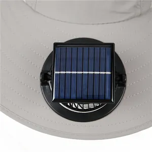 Detail of grey sun hat showing integrated solar panel for built-in cooling fan mechanism