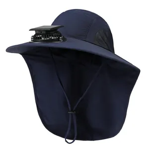 Detail of solar fan and neck protector on navy outdoor sun hat with mesh vents