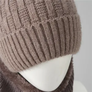 Detail of coffee brown waffle knit hat with thick plush lining and matching neck gaiter