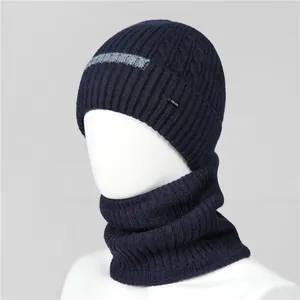 Detailed knit texture of navy blue winter hat and scarf set with soft fleece lining
