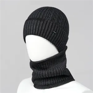 Detailed texture of thick ribbed knit hat and matching neck warmer with fleece lining