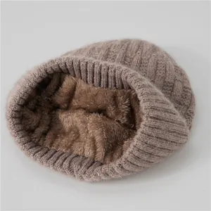 Brown winter knit hat for elderly women with warm fleece lining and thermal ear protection