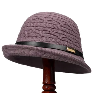 French style knitted wool cloche hat in mauve with cable pattern and leather strap