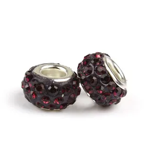 Sparkling dark purple and rose red rhinestones embedded in metal cylinder beads