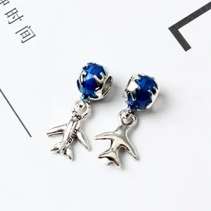 Airplane and blue enamel earth charms in silver alloy for DIY bead jewelry sets