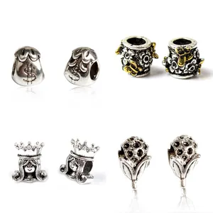 Lot de 48 perles en alliage argenté rétro avec motifs de sac d'argent et papillon