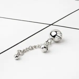 Detail of silver bead pendant with polished and textured finish for DIY jewelry