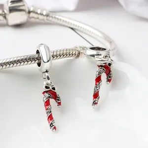 Christmas jewelry set with silver snake chain bracelet and red candy cane charms