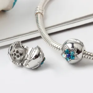 Bracciale a maglia serpente argento con charm clip a stella e strass blu